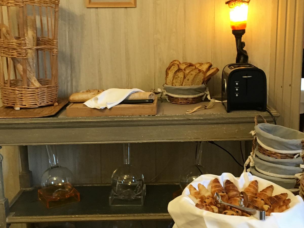 La Roseraie Hotel Restaurant มงทิญญัก ภายนอก รูปภาพ
