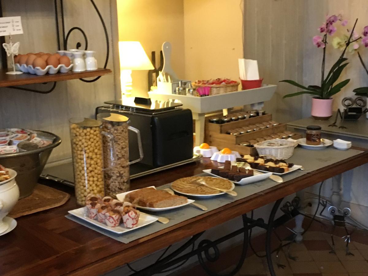 La Roseraie Hotel Restaurant มงทิญญัก ภายนอก รูปภาพ
